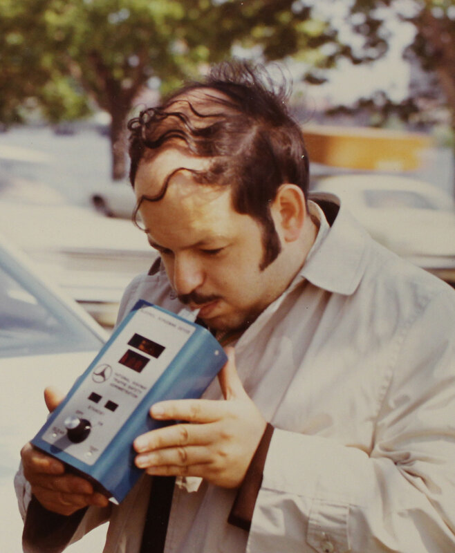 Demonstrating an Alcohol Breath Analyzer.