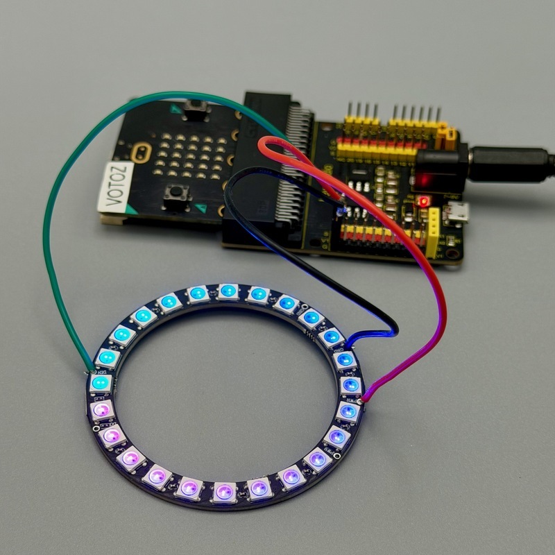 A WS2812B ring lit with a rainbow gradient, driven by the code above. Photo by the Author