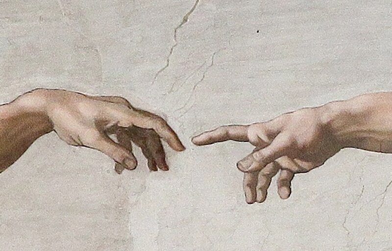 Michelangelo's The Creation of Adam (detail), Sistine Chapel ceiling — God and Adam's fingers reach toward each other but never quite touch.