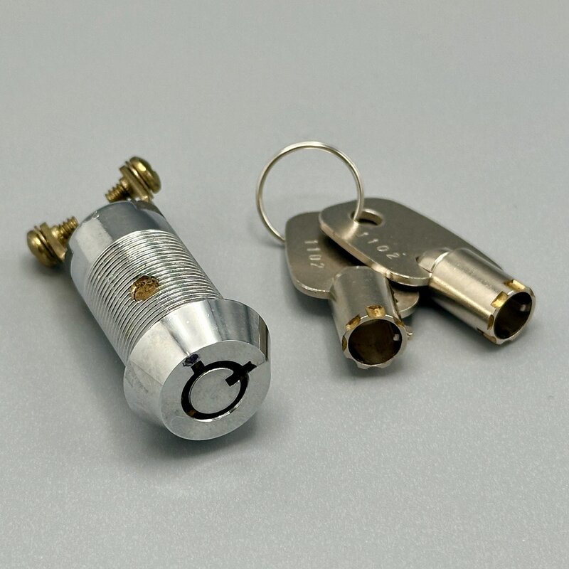 A keyed rotary switch that only operates with a physical key, adding real-world authorization to a digital action. Photo by the Author