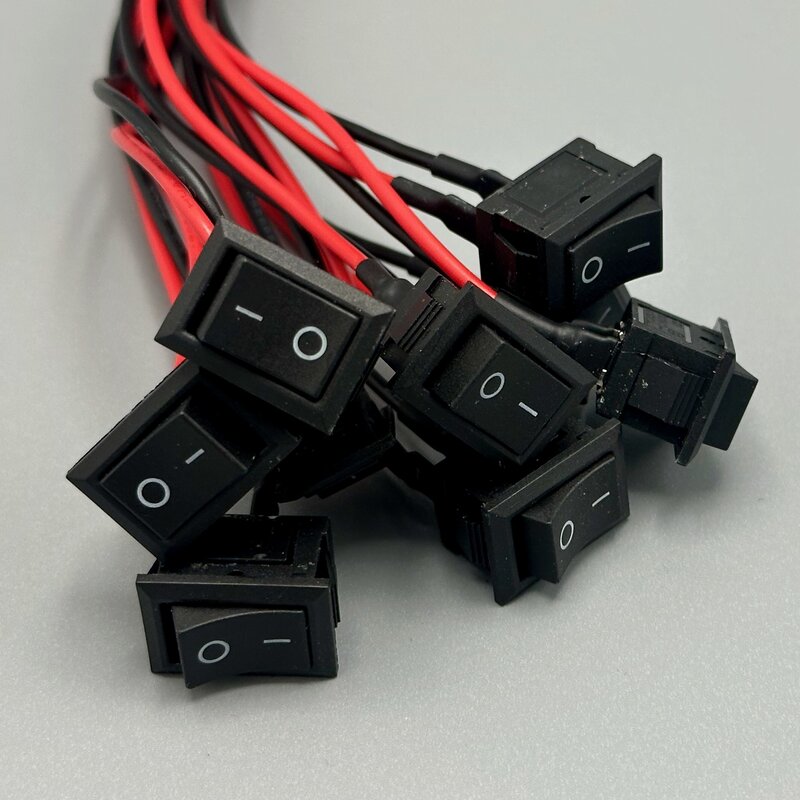 A latching rocker or toggle power switch that stays in position until flipped again. Photo by the Author