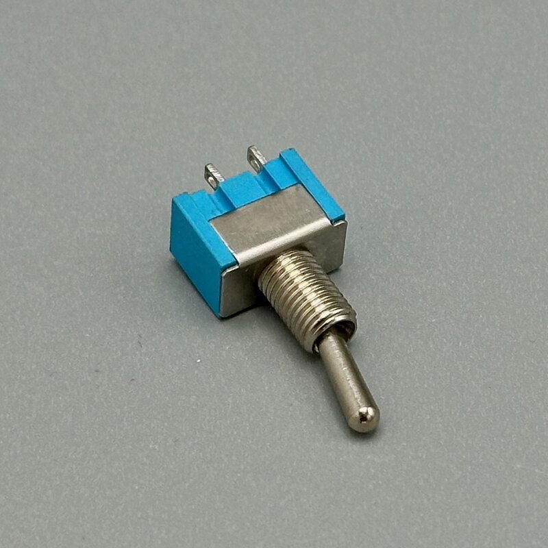 A latching toggle switch in two- or three-position form, its position readable at a glance. Photo by the Author
